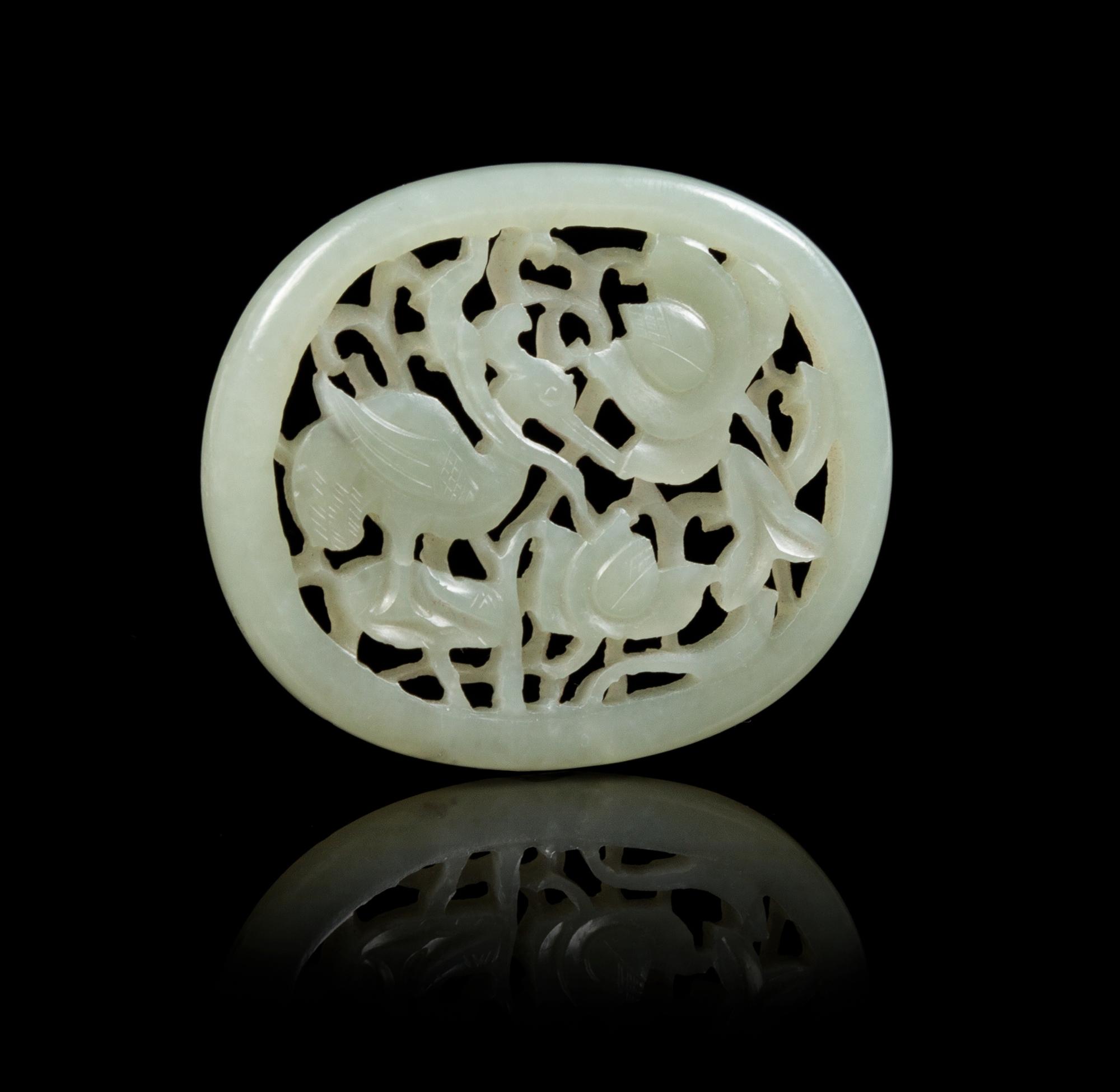 A Pierced Carved Jade Pendant Diameter 2 3/8 inches.