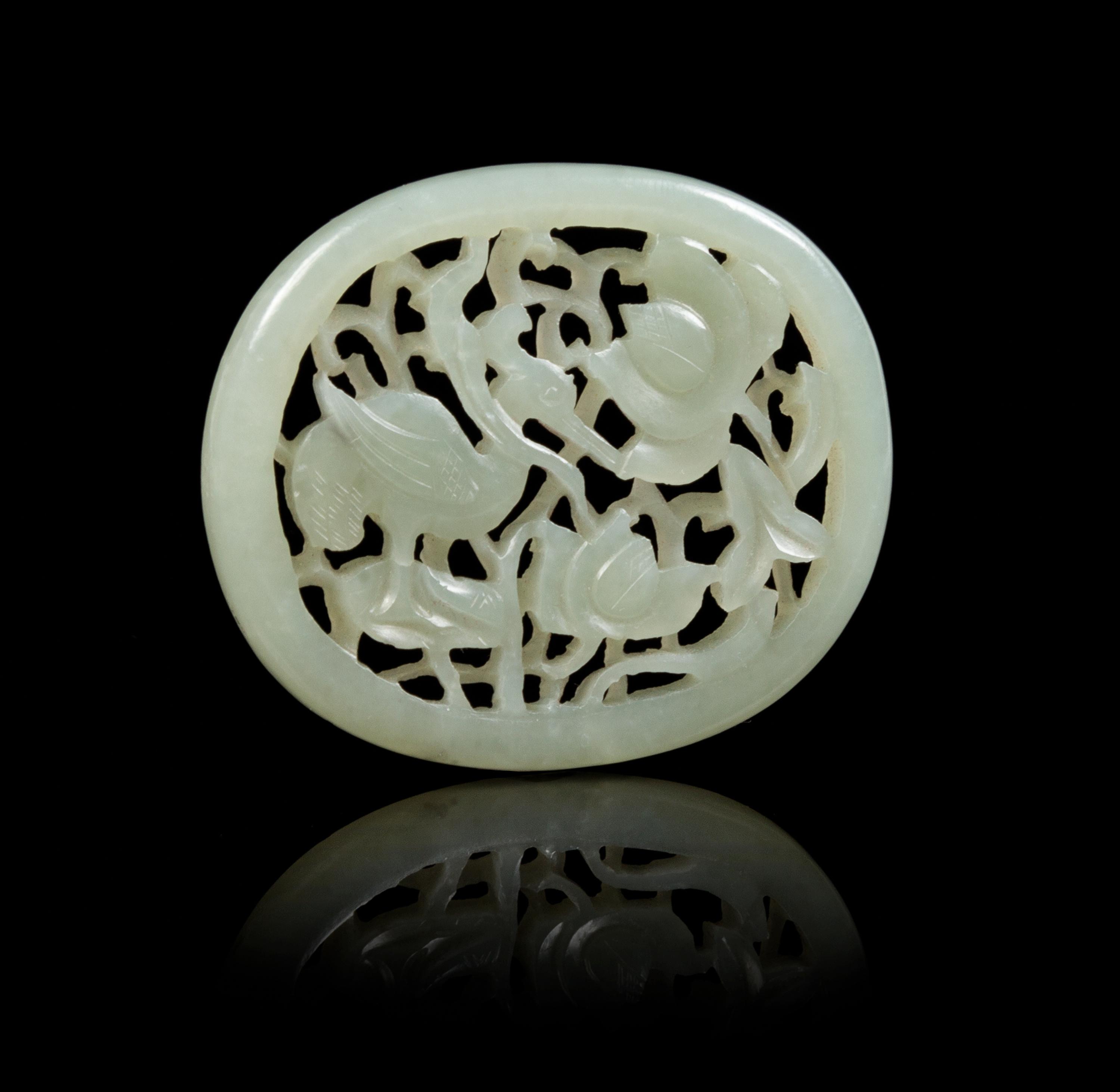 A Pierced Carved Jade Pendant Diameter 2 3/8 inches.