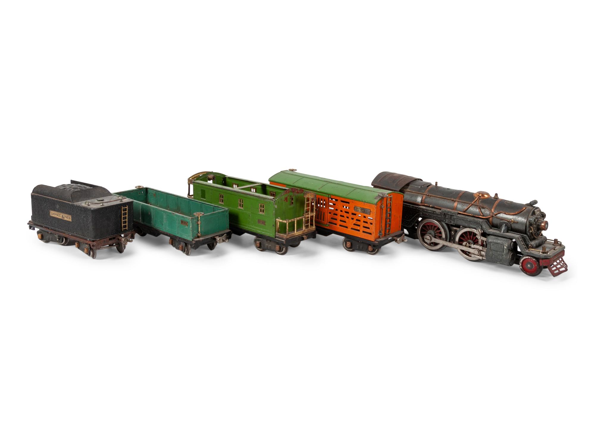 A Lionel 385E Loco Engine and Tender, Three Lionel Train Cars, Four American Flyer Line Cars and Other Accessories