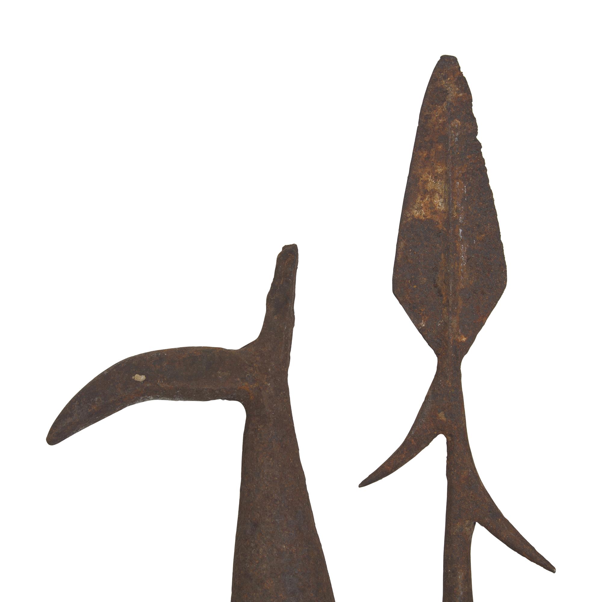 A Collection of Twenty-One Wrought Iron Eel Forks and Whaling Implements