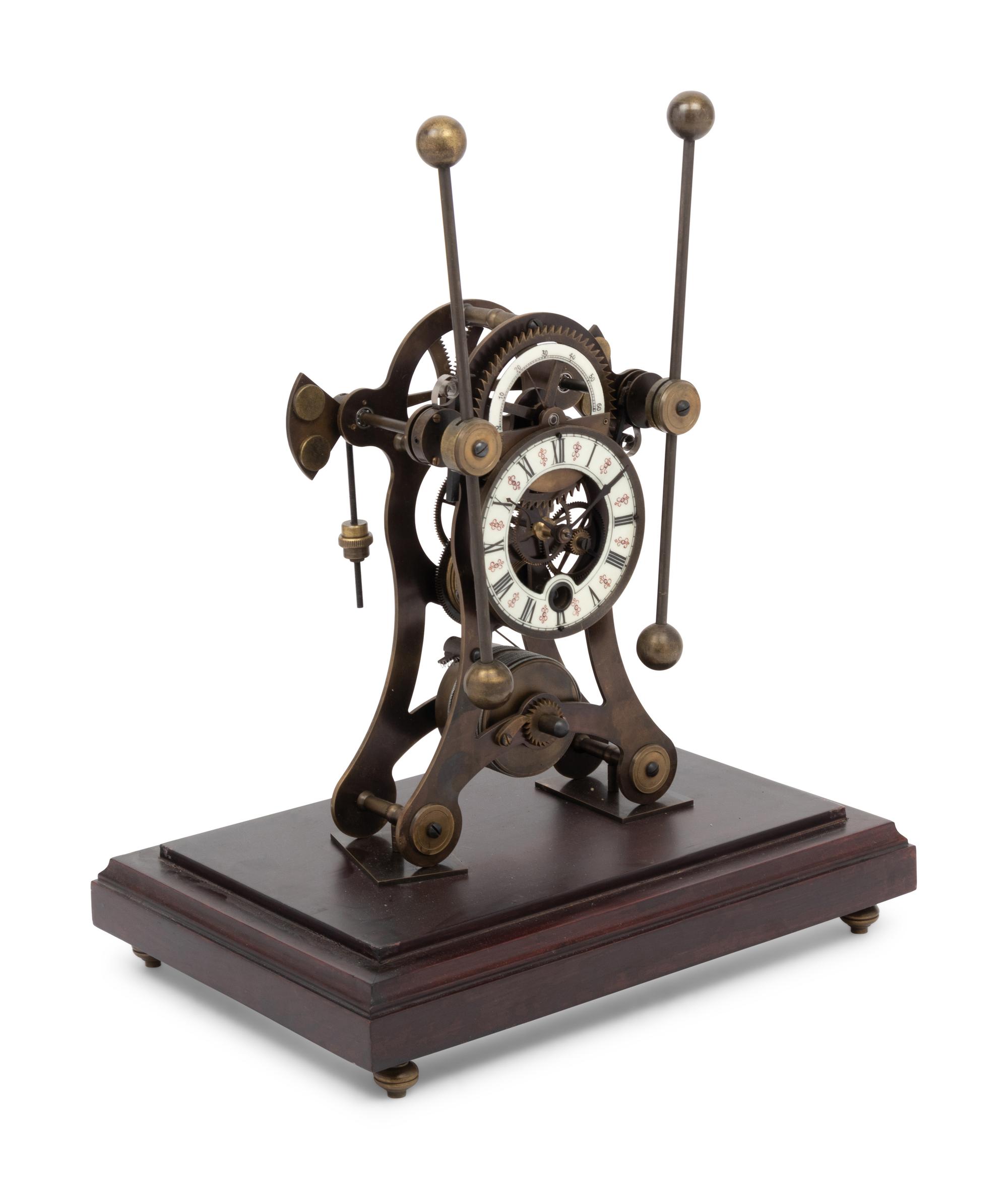 A Continental Cased Brass Skeleton Clock