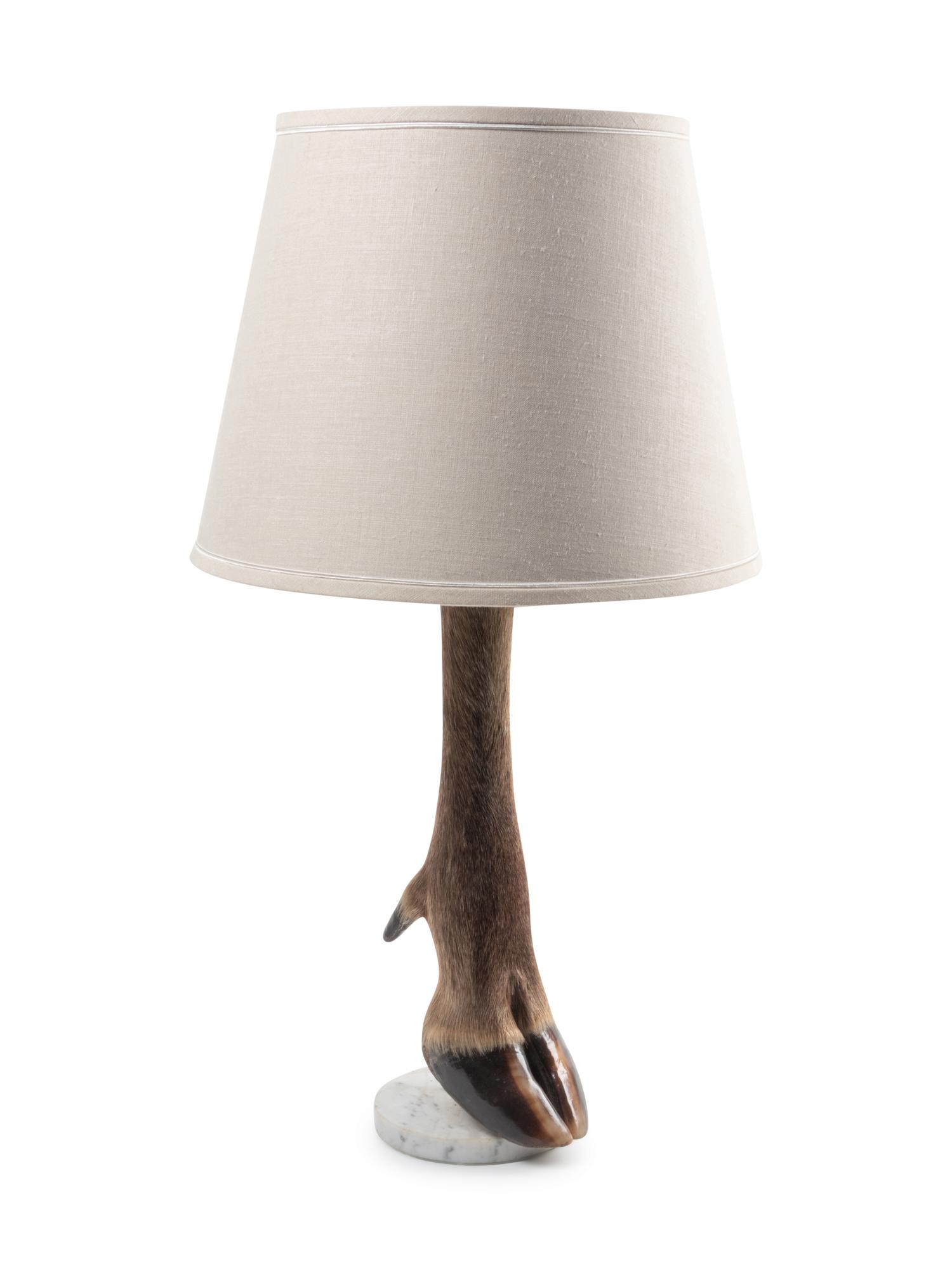 A Taxidermy Deer Leg Table Lamp