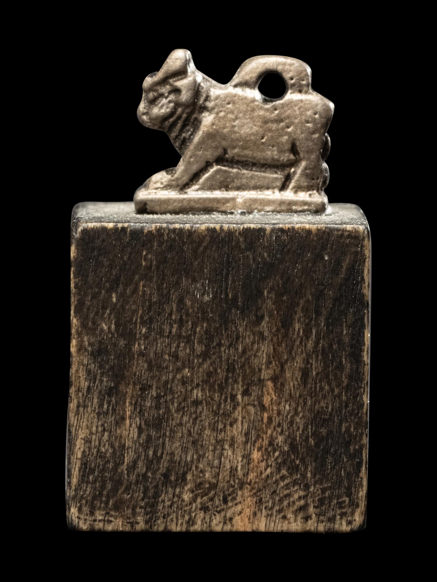 An Egyptian Silver Apis Amulet