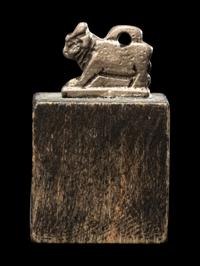 An Egyptian Silver Apis Amulet