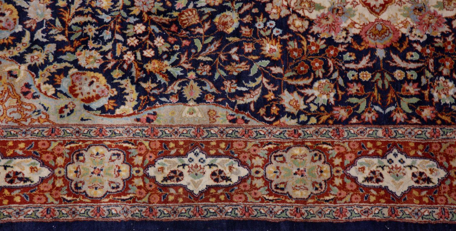 A Tabriz Wool Rug