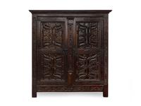 A Renaissance Revival Carved and Stained Oak Kas — 19TH CENTURY