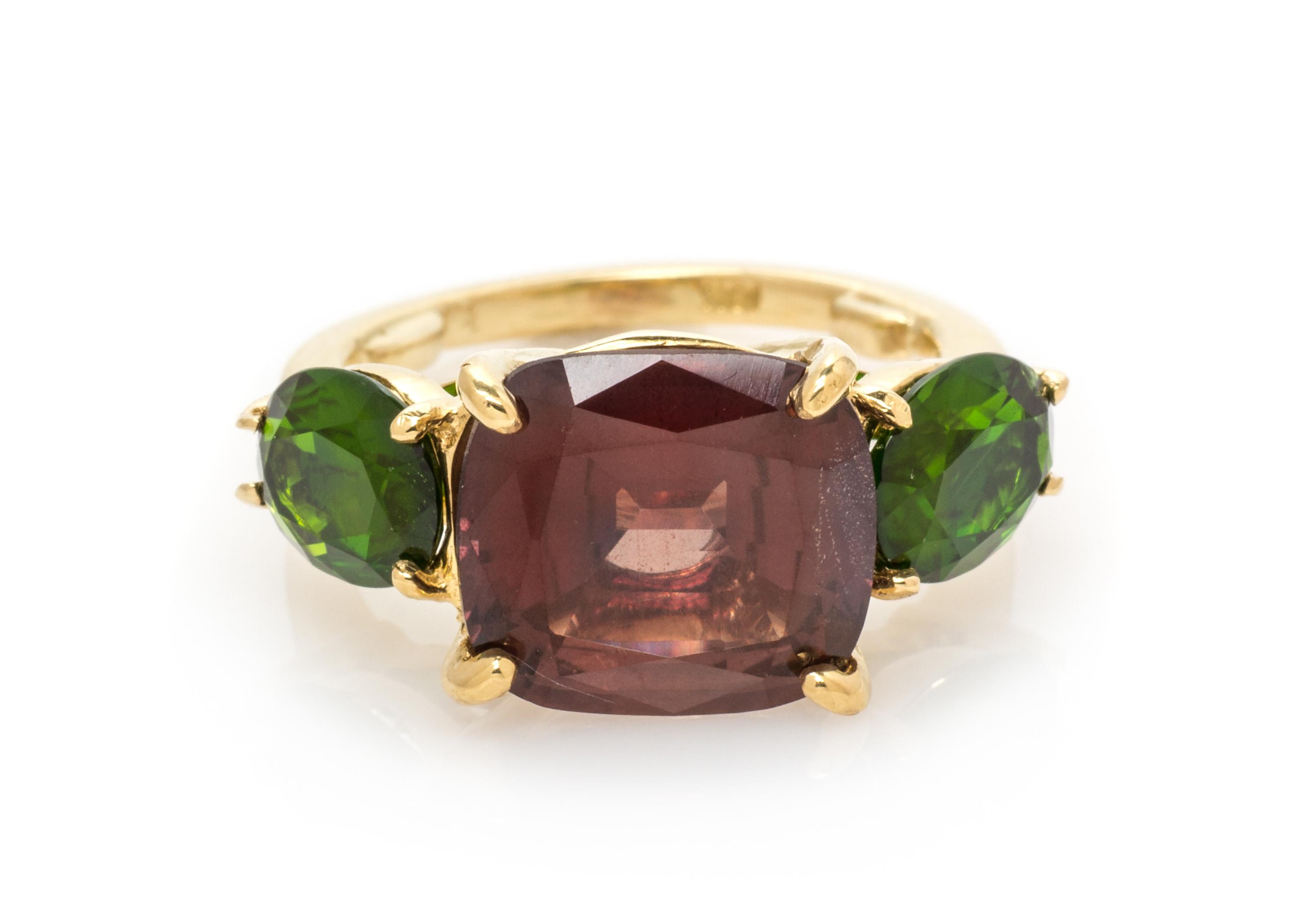 An 18 Karat Yellow Gold, Pinkish Brown Sapphire and Chrome Diopside Ring, 3.90 dwts.