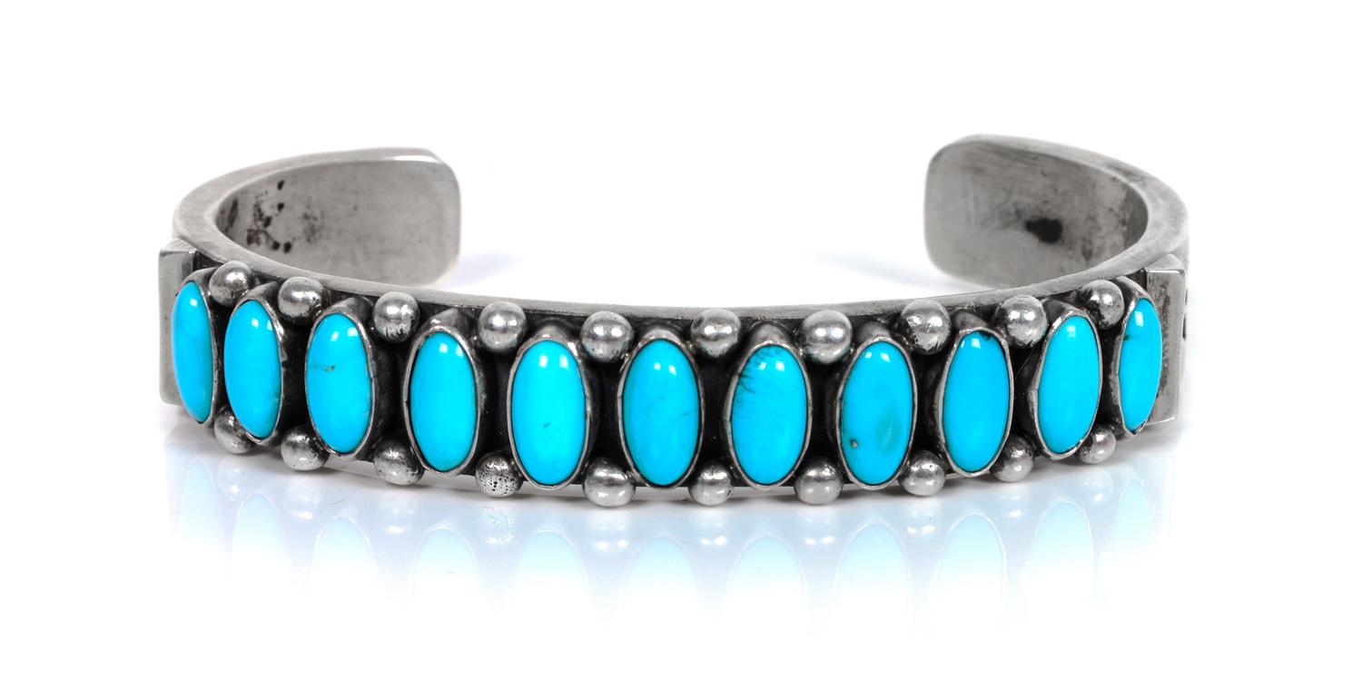Three Southwestern Silver and Turquoise Cuff Bracelets Length of largest 5 1/2 x opening 1 1/2 inches.