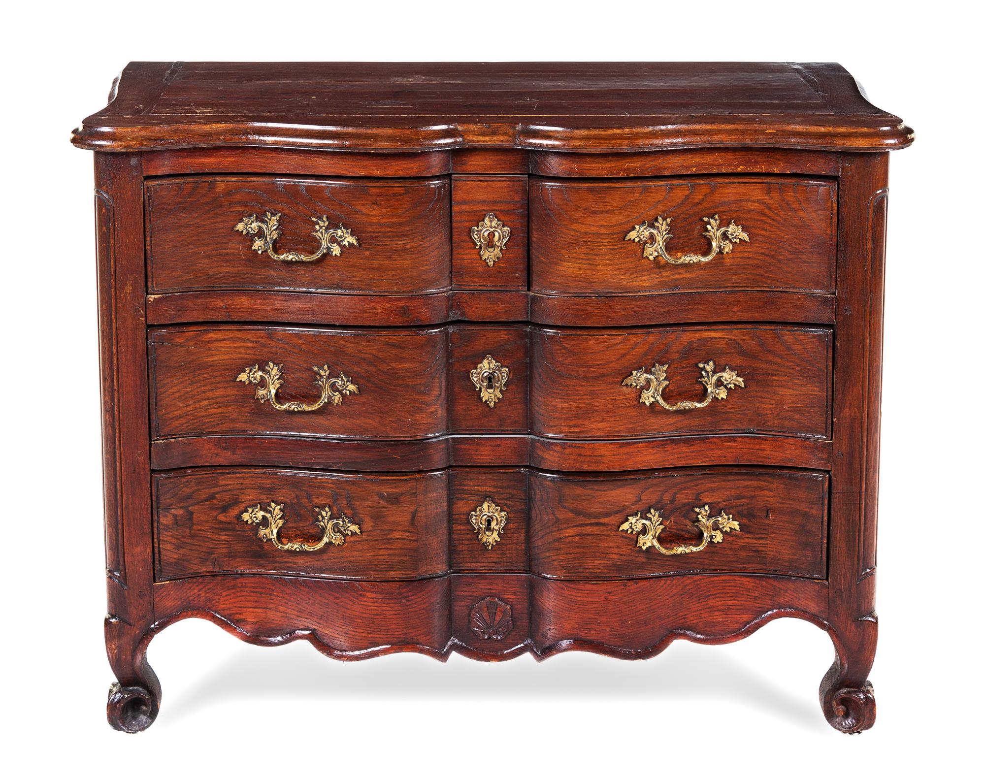A Louis XV Oak Commode Height 34 x width 42 1/2 x depth 20 inches. — 18TH CENTURY