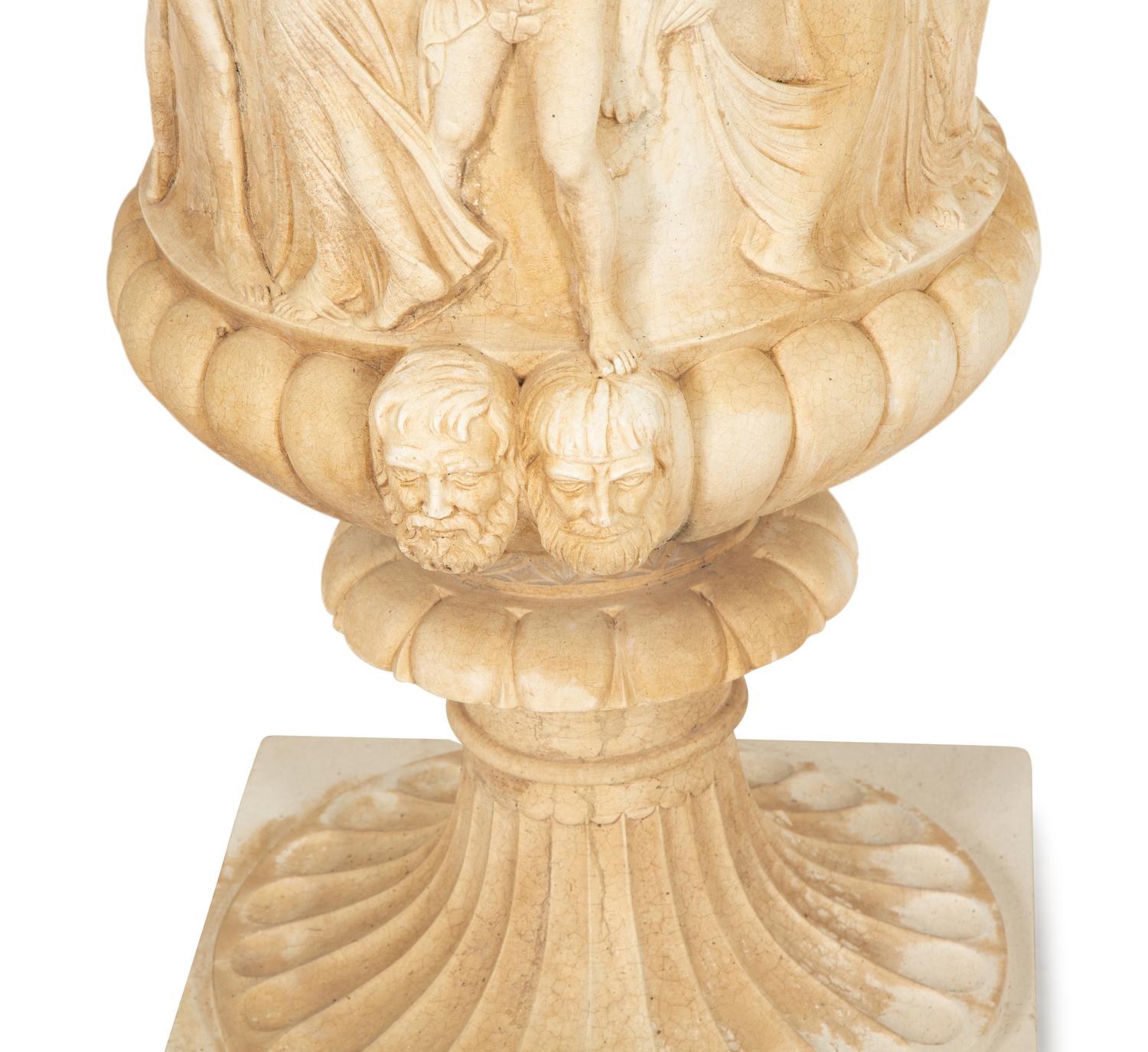 A Pair of Cast Stone Campana Urns