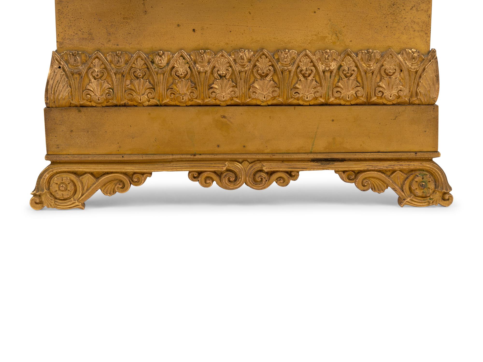 A Charles X Gilt and Patinated Bronze Figural Mantel Clock