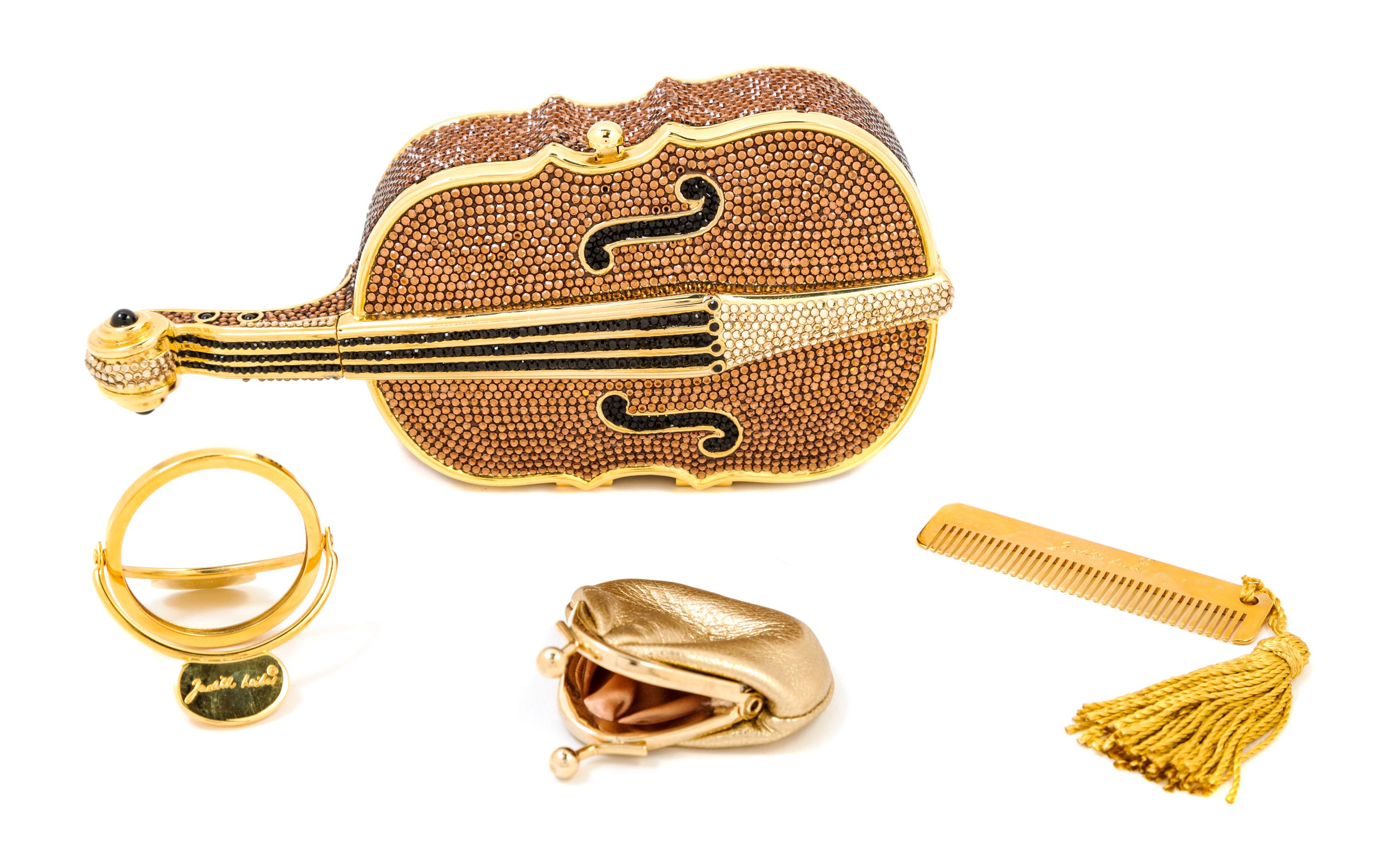 A Judith Leiber Crystal Cello Minaudiere, 3.5" x 7.5" x 1.5".