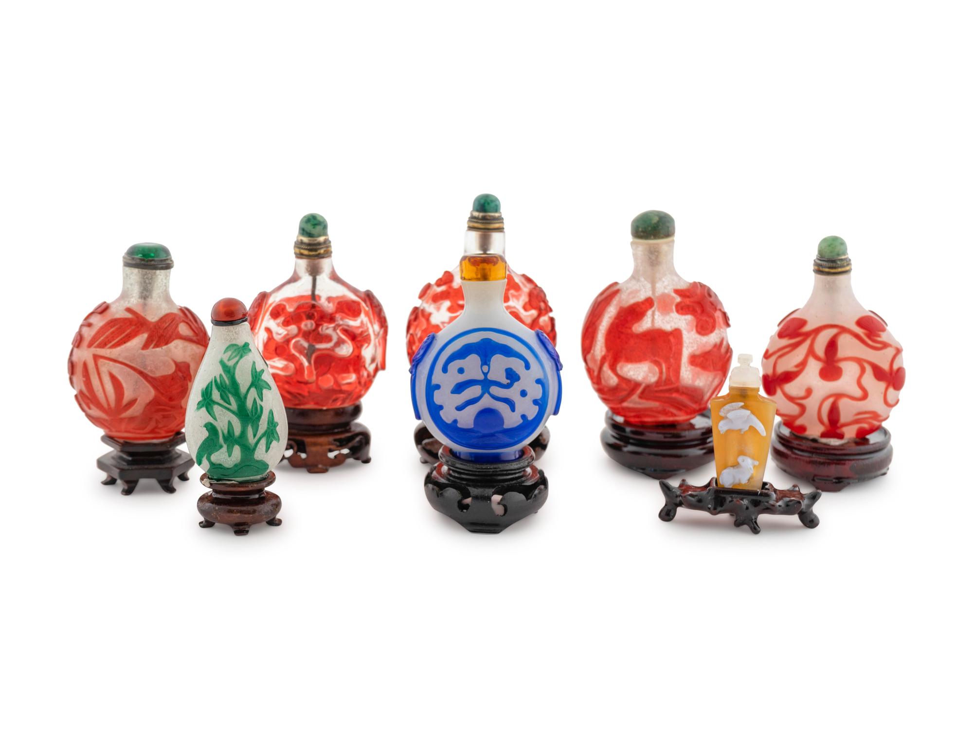 A Group of Eight Chinese Glasswork Snuff Bottles