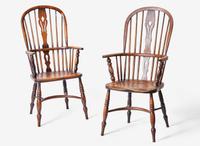 A pair of English provincial carved elm and ash Windsor armchairs, 19th century