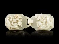 A Carved White Jade ‘Chilong’ Belt Buckle