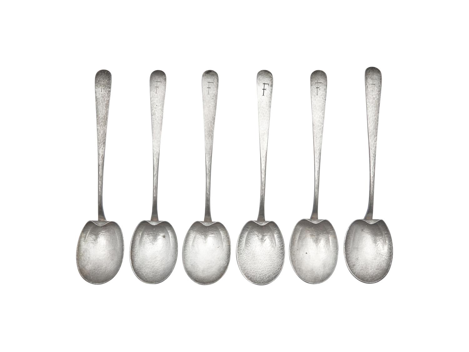 A Set of Six Arts & Crafts Hammered Silver Teaspoons