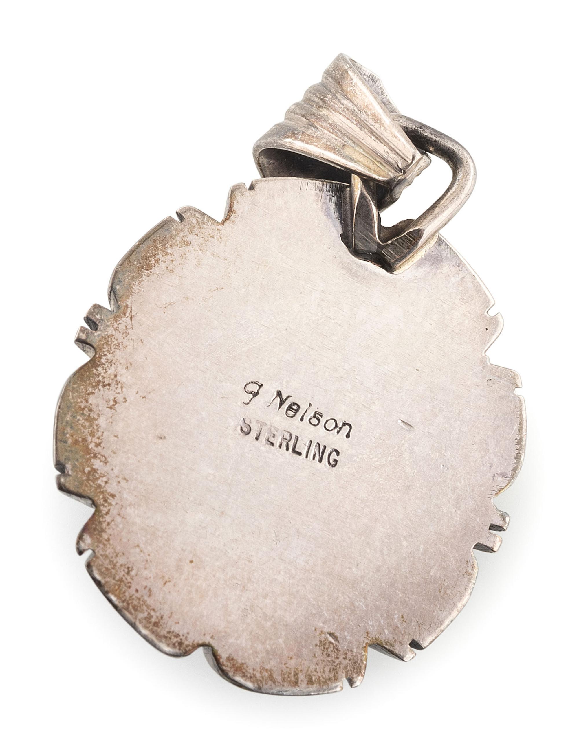 Navajo and Kewa Silver Pendants