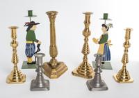 A Group of Eight Candlesticks Height of tallest 12 inches.