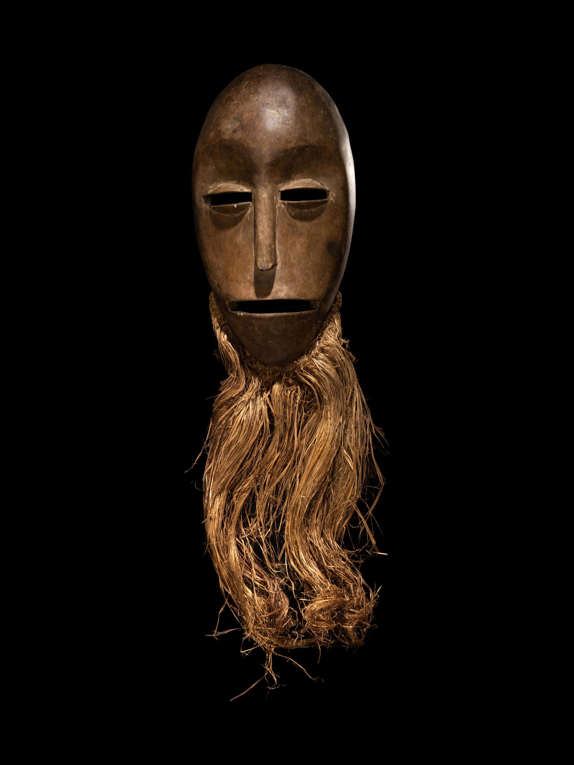 An African Wood Dance Mask With Beard