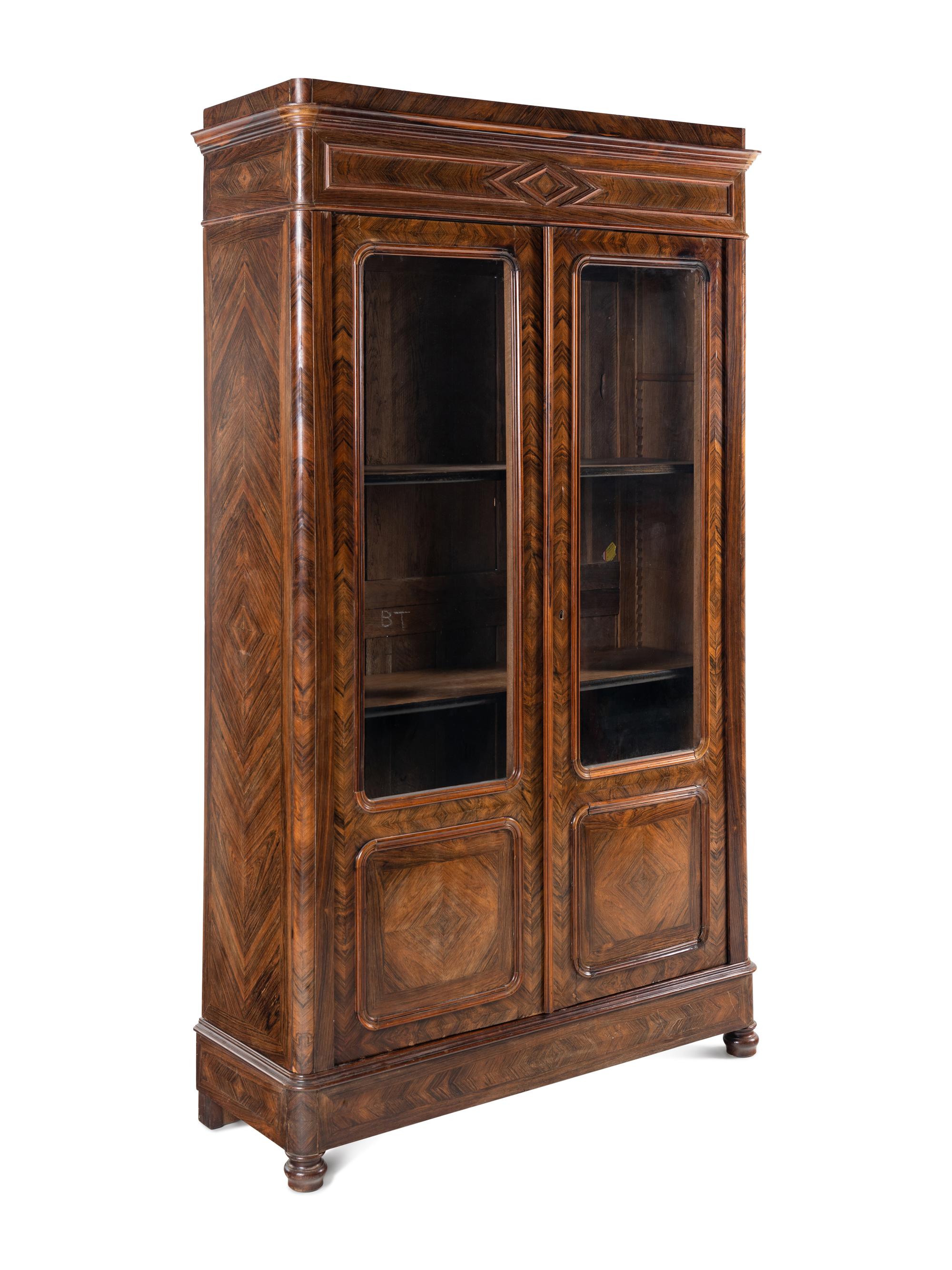 A Continental Walnut Bookcase