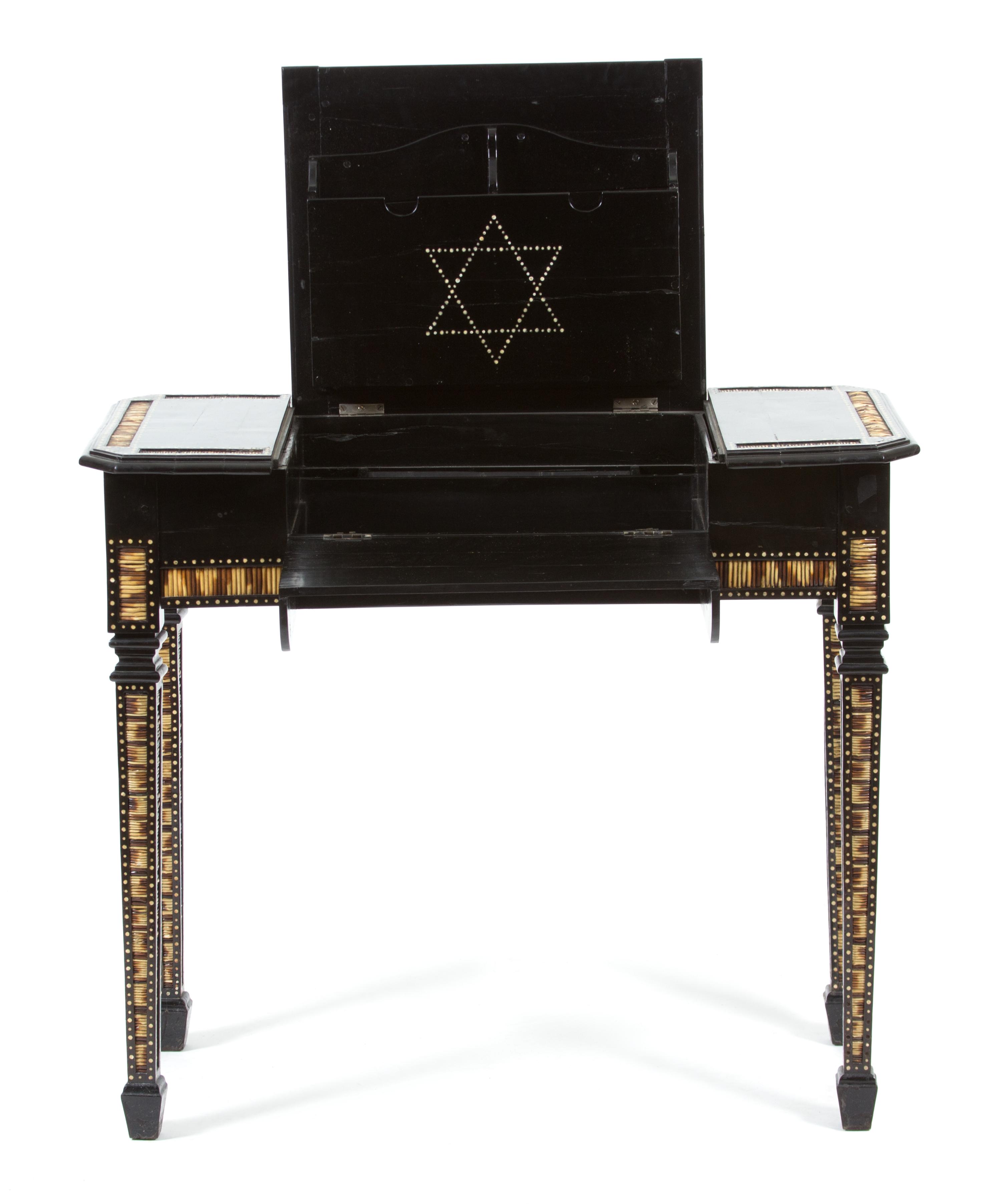 A Ceylonese Ebony and Porcupine Quill Console Table Height 30 x width 35 x depth 17 1/2 inches. — 20TH CENTURY
