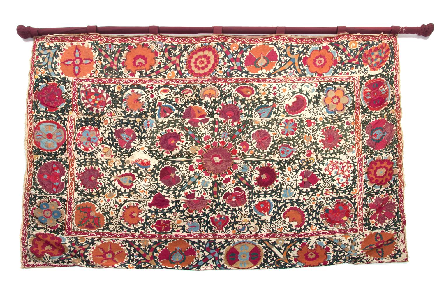 A Suzani Embroidered Panel 5 feet 4 inches x 7 feet 6 inches.