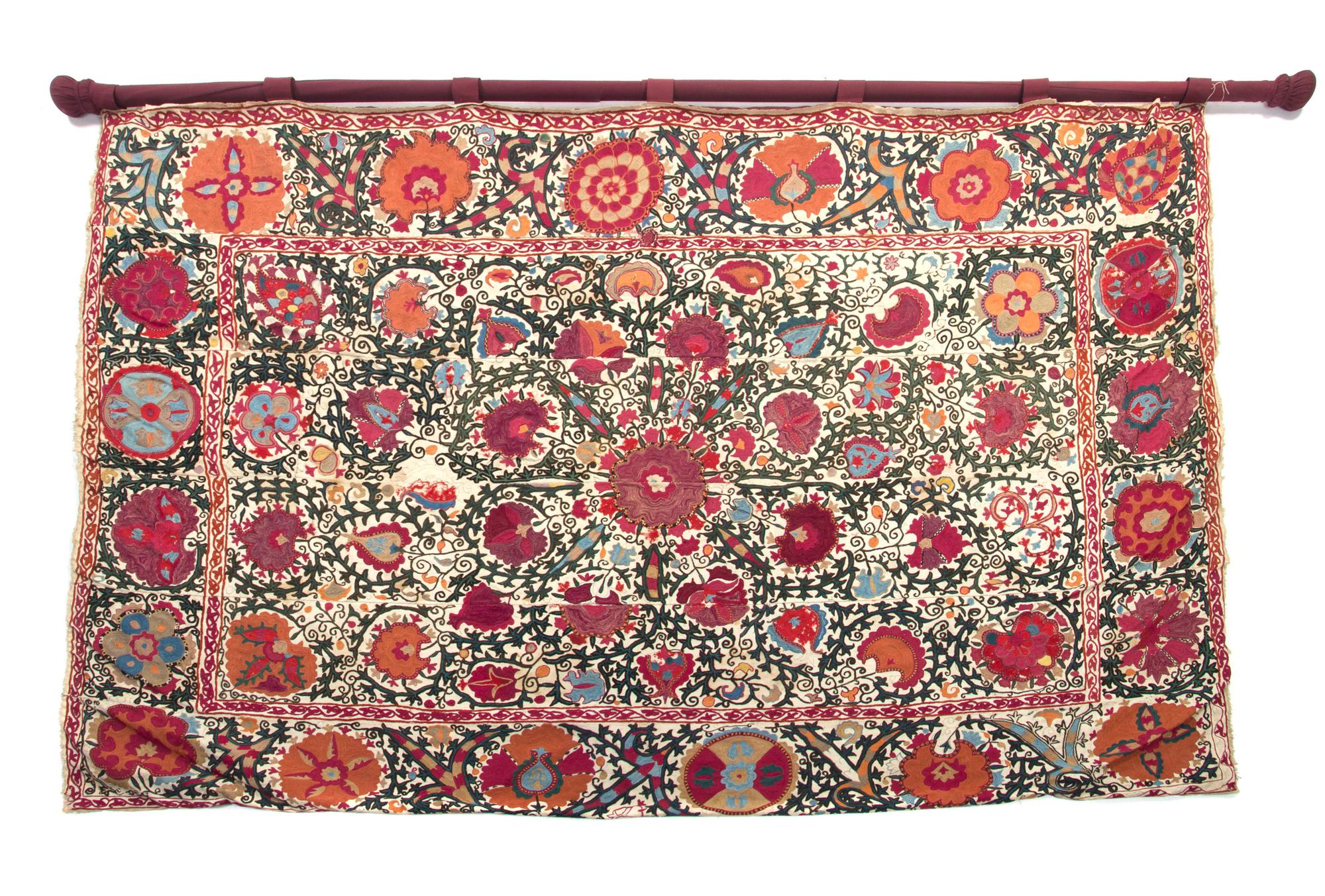 A Suzani Embroidered Panel 5 feet 4 inches x 7 feet 6 inches.