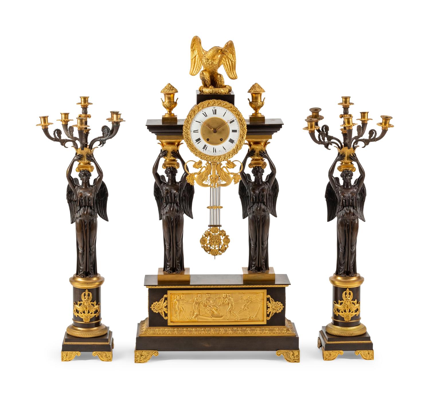 A Large Empire Style Gilt and Patinated Bronze Clock Garniture