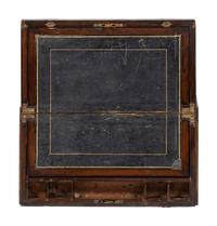 A Georgian Brass Mounted Mahogany Campaign Desk on Stand