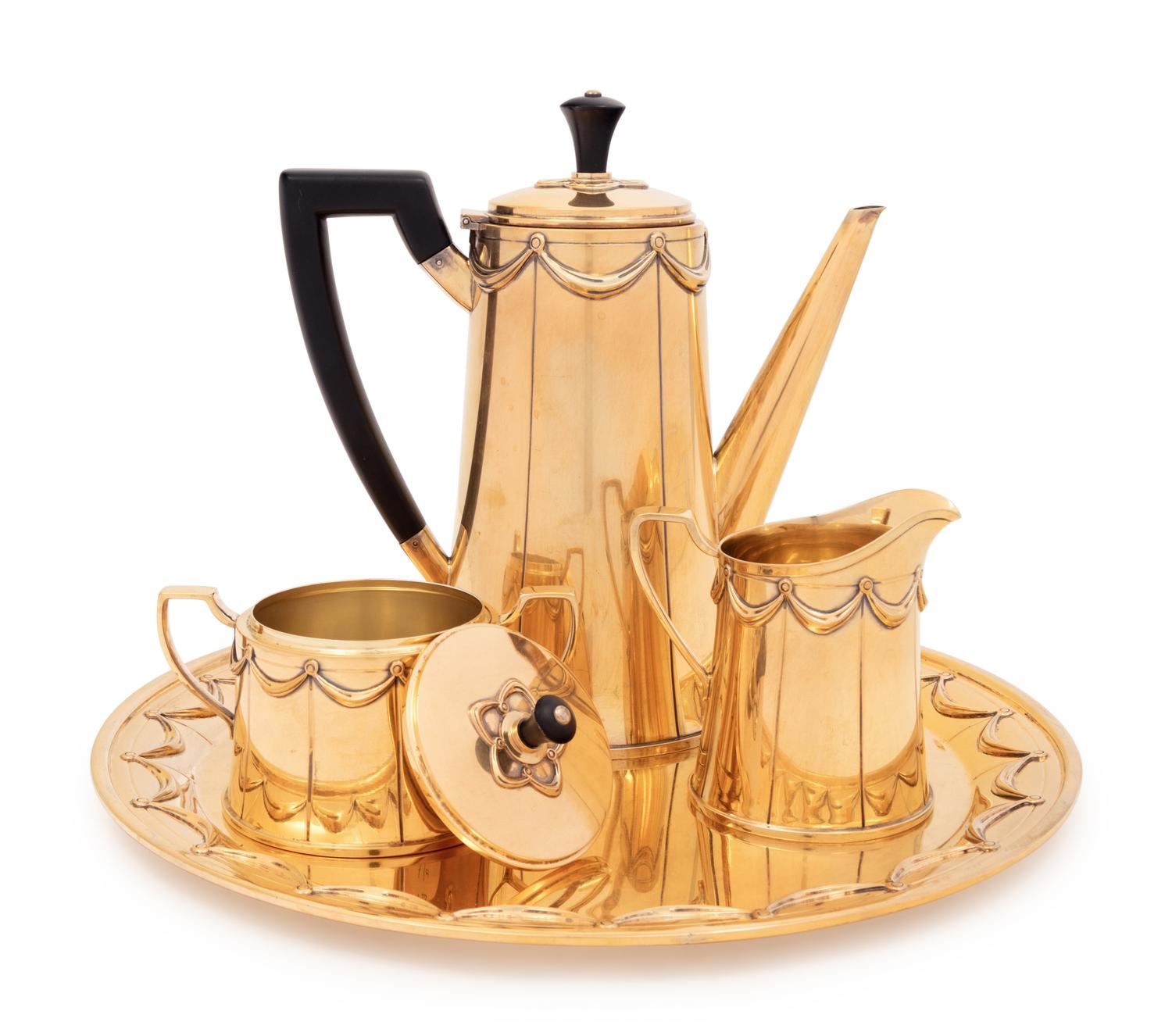 A Tiffany & Co. Silver-Gilt Four-Piece Coffee Service