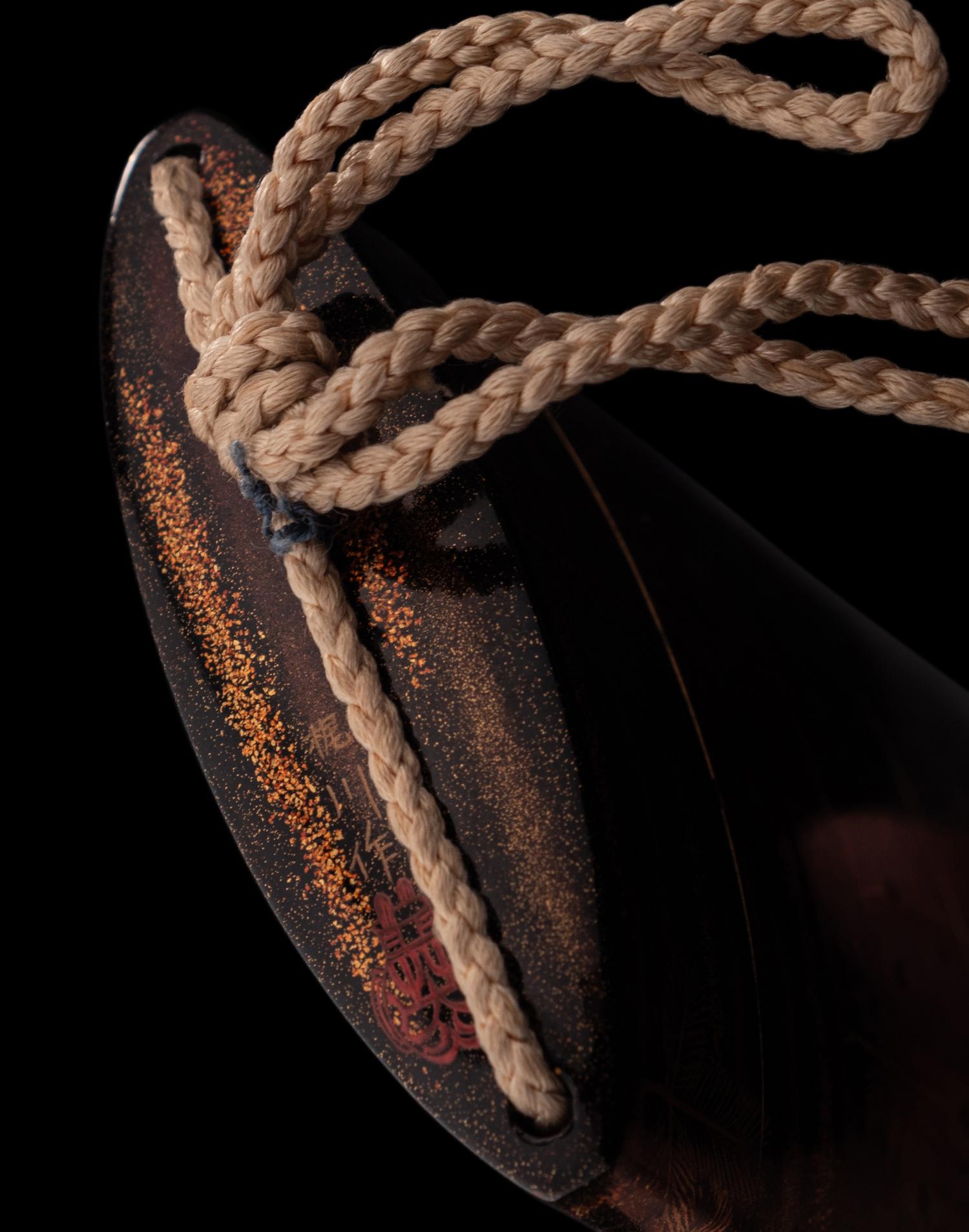 A Japanese Gold and Black Four-Case Inro