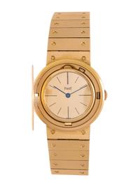 PIAGET, REF. 950 18K YELLOW GOLD AND COIN SURPRISE WRISTWATCH