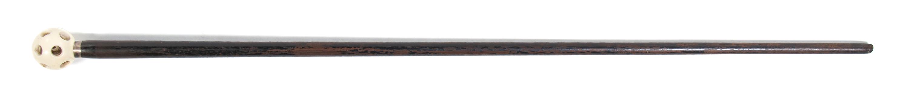 An Ivory and Ebonized Wood Walking Stick, Height overall 35 3/4 x diameter of handle 1 3/4 inches.