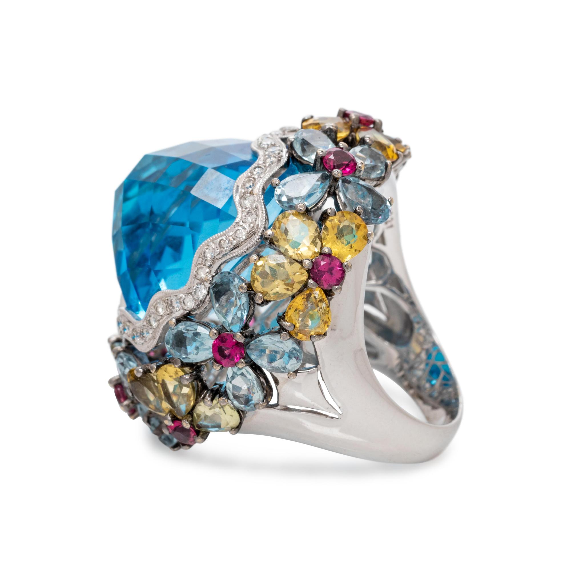 BLUE TOPAZ, DIAMOND AND SAPPHIRE RING