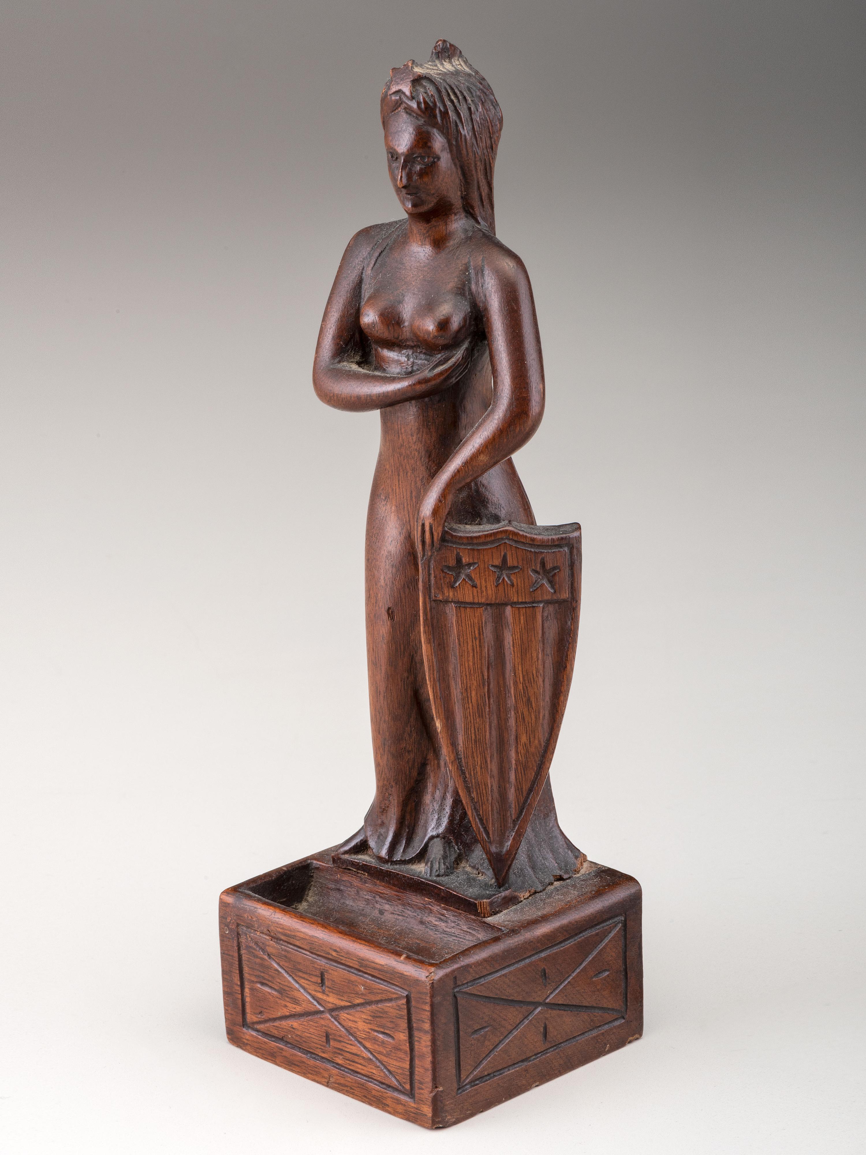 A Carved Mahogany Figure of Lady Liberty