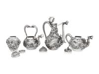An Ornate Japanese Export Silver Eight-Piece Tea and Coffee Service