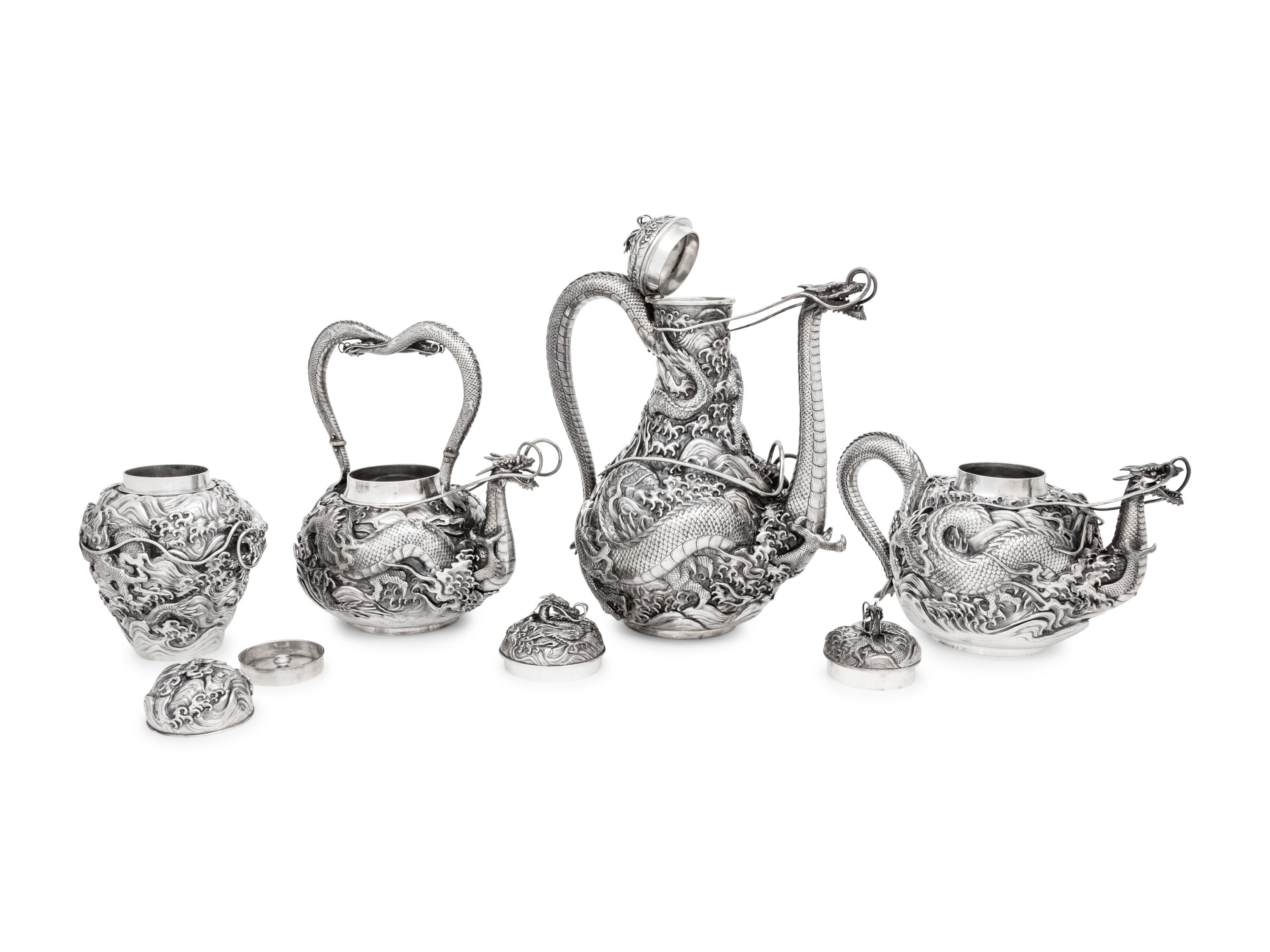 An Ornate Japanese Export Silver Eight-Piece Tea and Coffee Service
