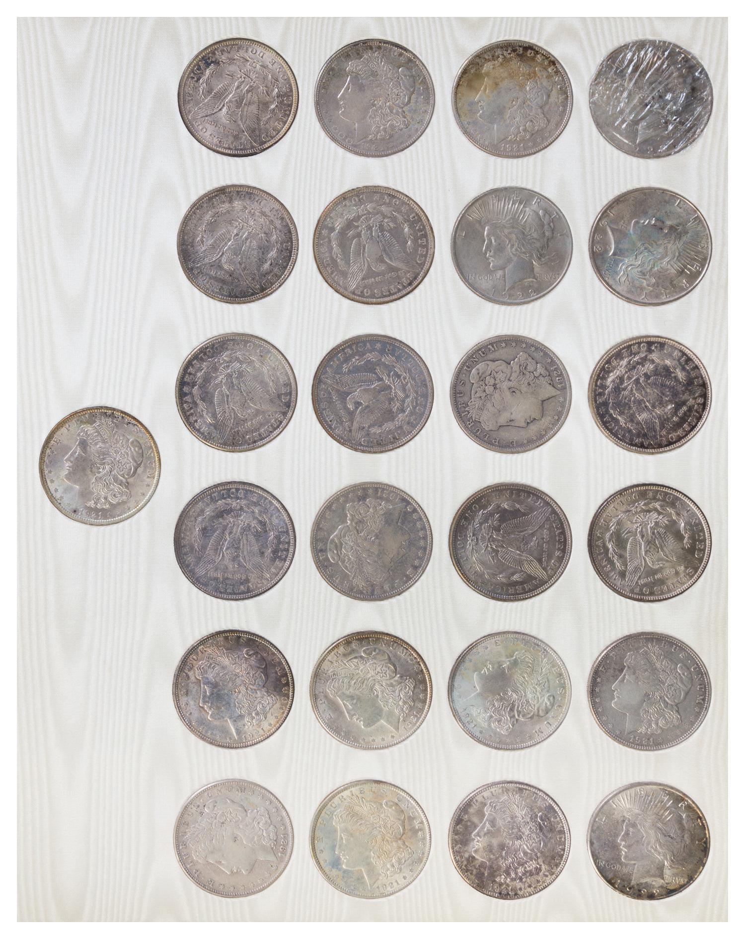 A Set of Twenty-Five Morgan Silver Dollars