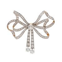 EDWARDIAN, DIAMOND AND PLATINUM-TOPPED GOLD BOW BROOCH