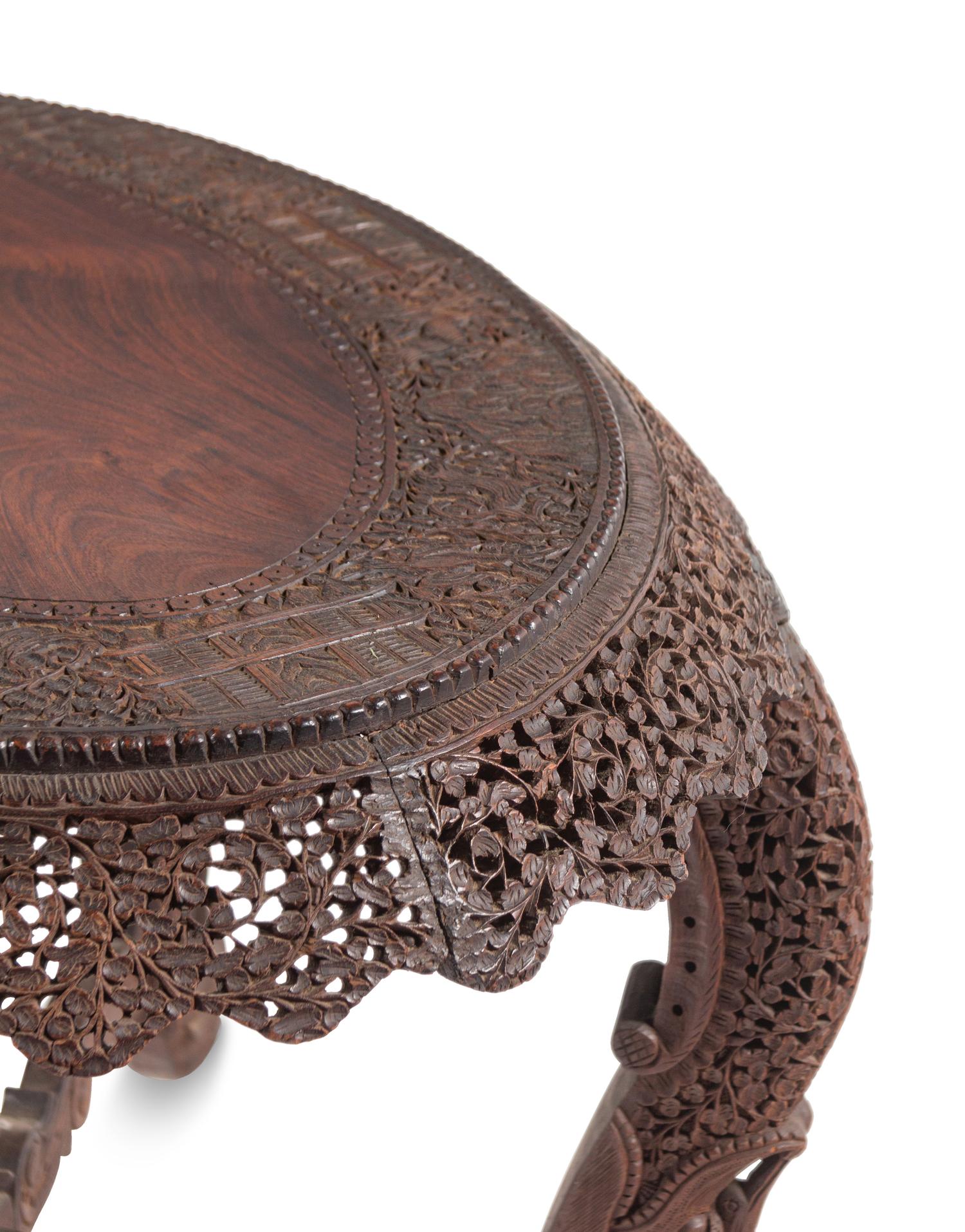An Anglo-Indian Carved Teakwood Table