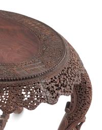 An Anglo-Indian Carved Teakwood Table