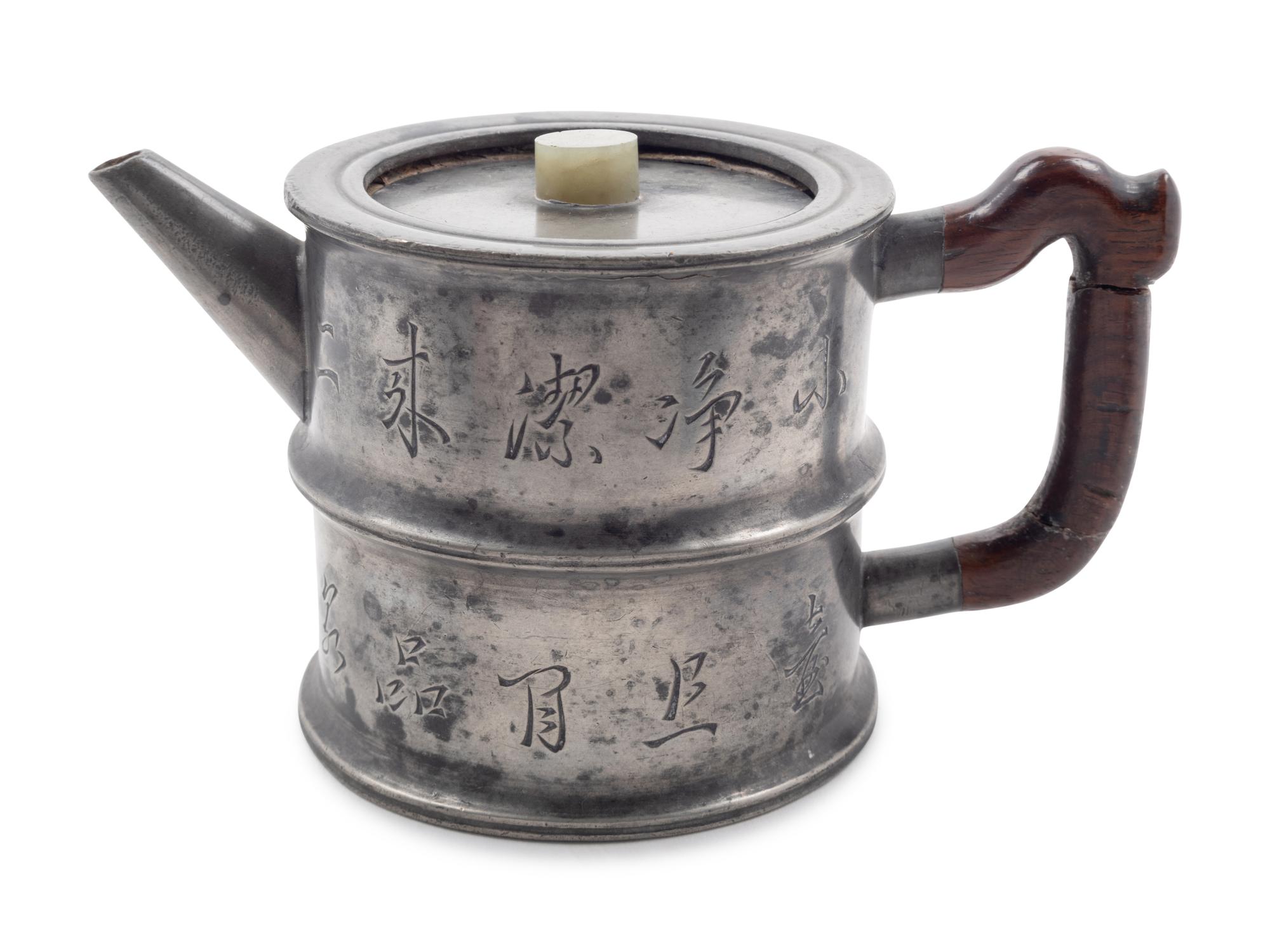A Chinese Pewter Encased Yixing Pottery Teapot