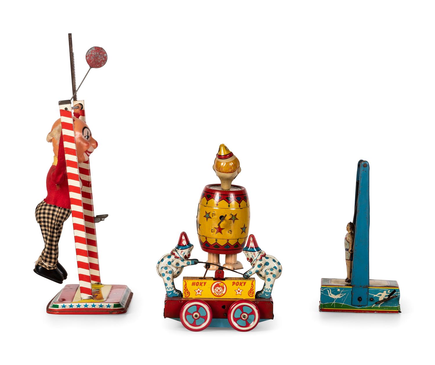 Four Tin Circus and Clown Toys