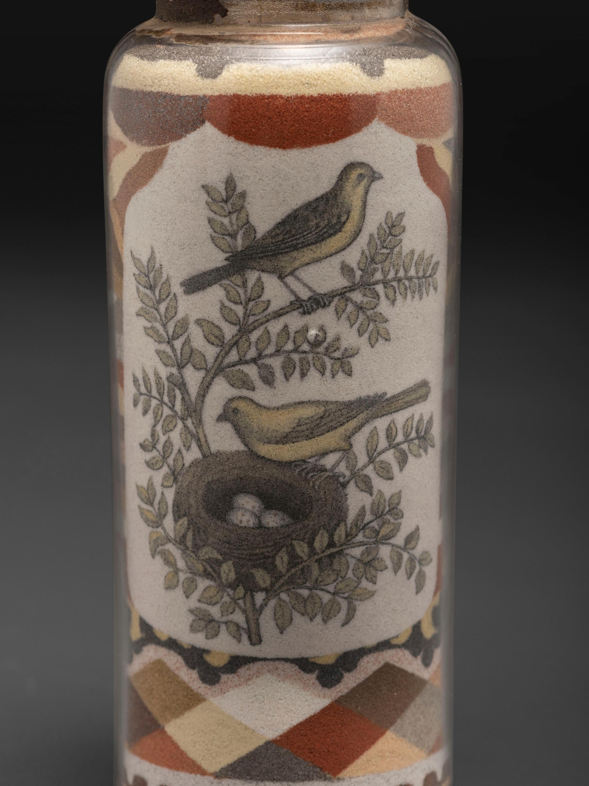 A Pair of Andrew Clemens (American, 1857-1894) 'Sweetheart' Sand Bottles