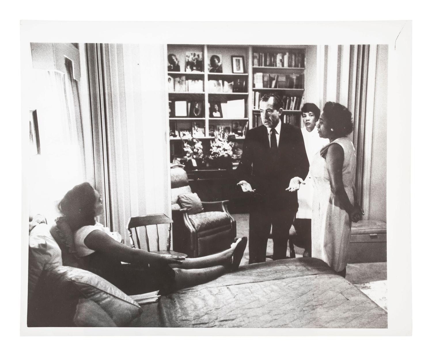 [KING, Martin Luther, Jr. (1929-1968)]. Press photograph of Richard Nixon visiting Coretta Scott King at her Atlanta home following Dr. King's death. 10 April 1968. COMBINED WITH #68.