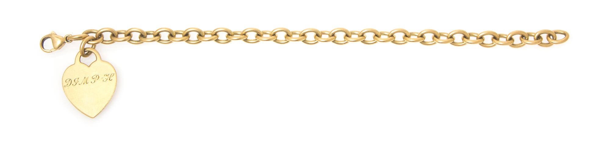 An 18 Karat Yellow Gold Charm Bracelet, Tiffany & Co., 18.50 dwts.