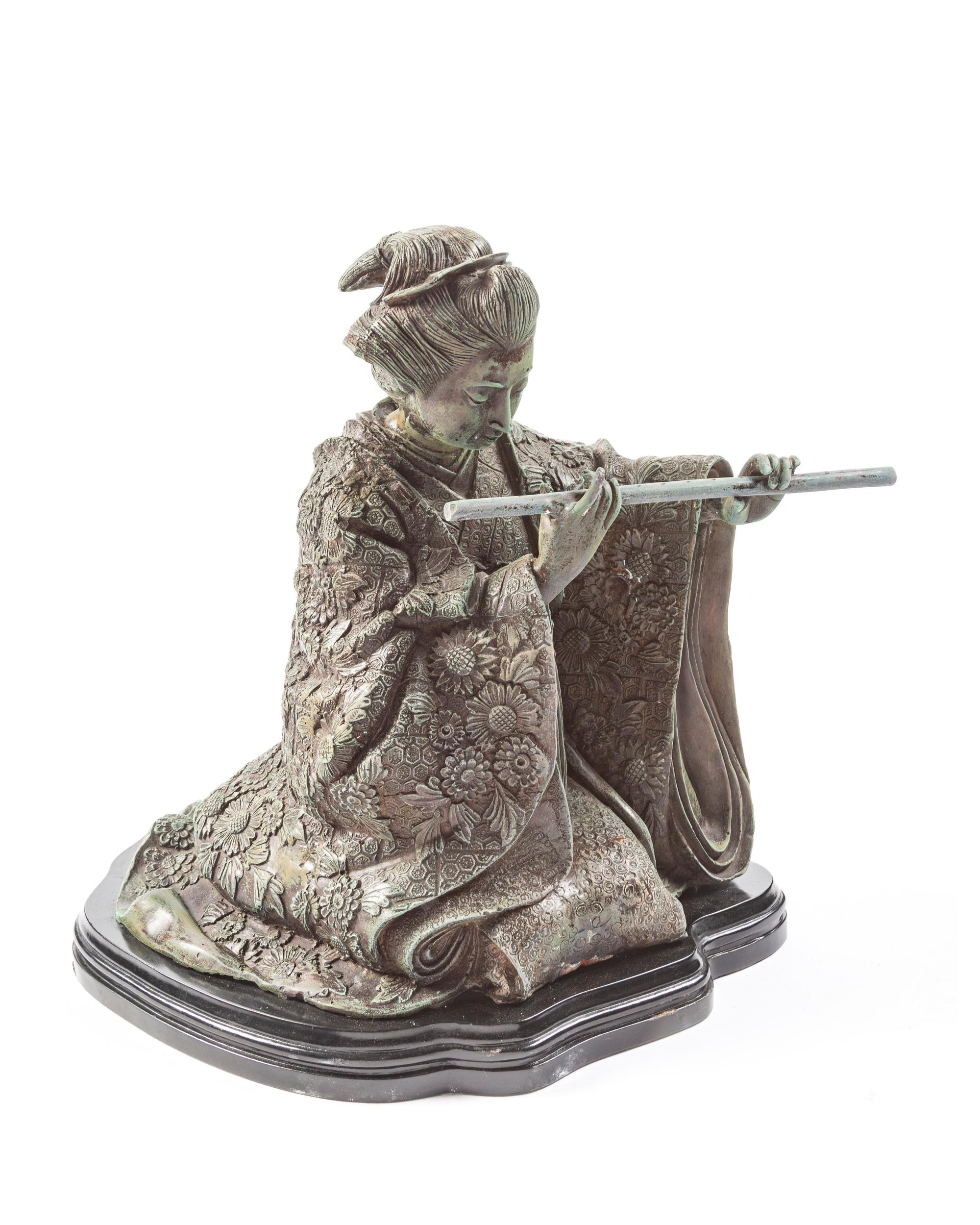 A Japanese Bronze Figure of a Woman Playing the Flute