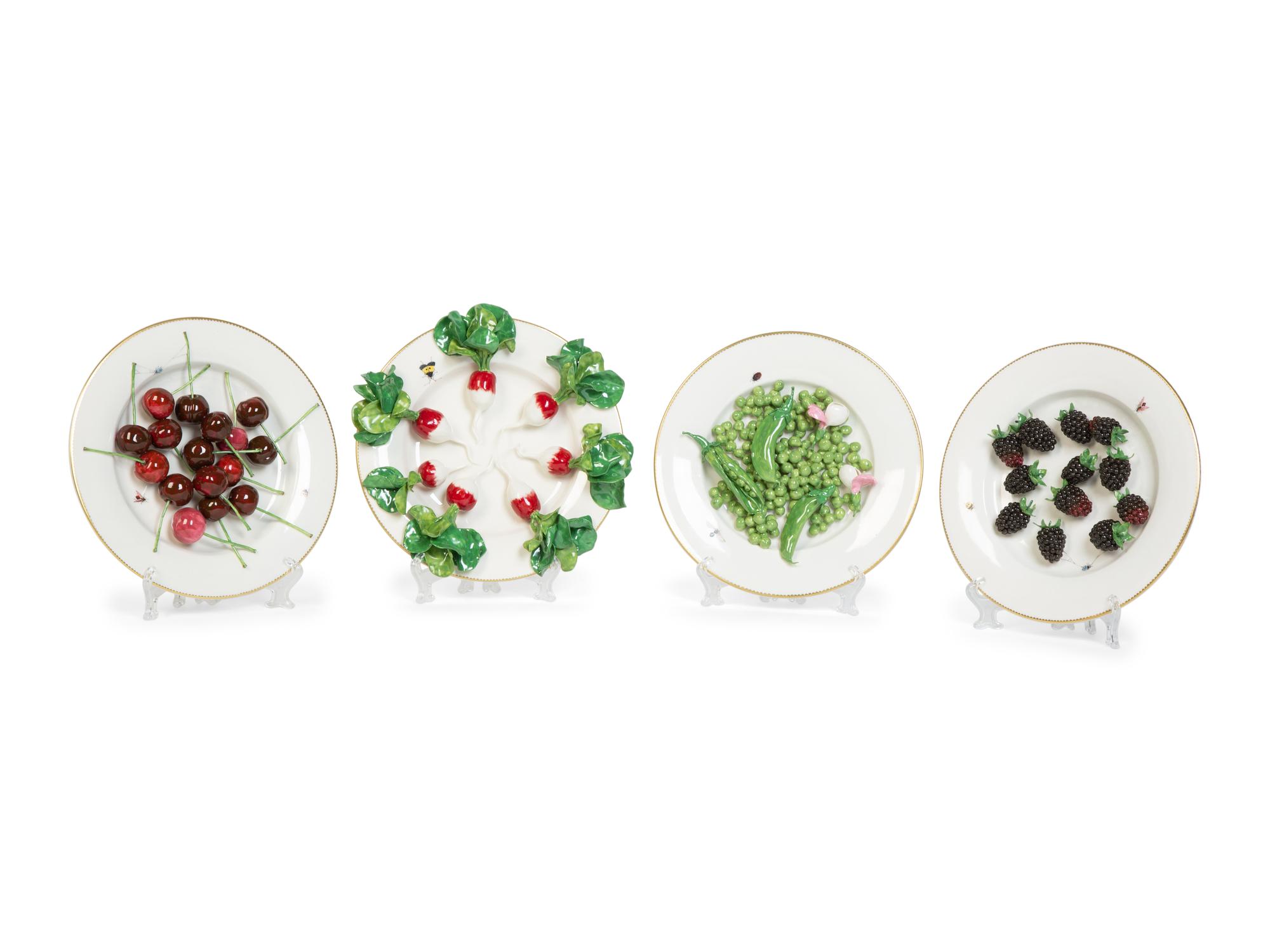 A Group of Four French Faience Tromp L'Oeil Plates — 20TH CENTURY