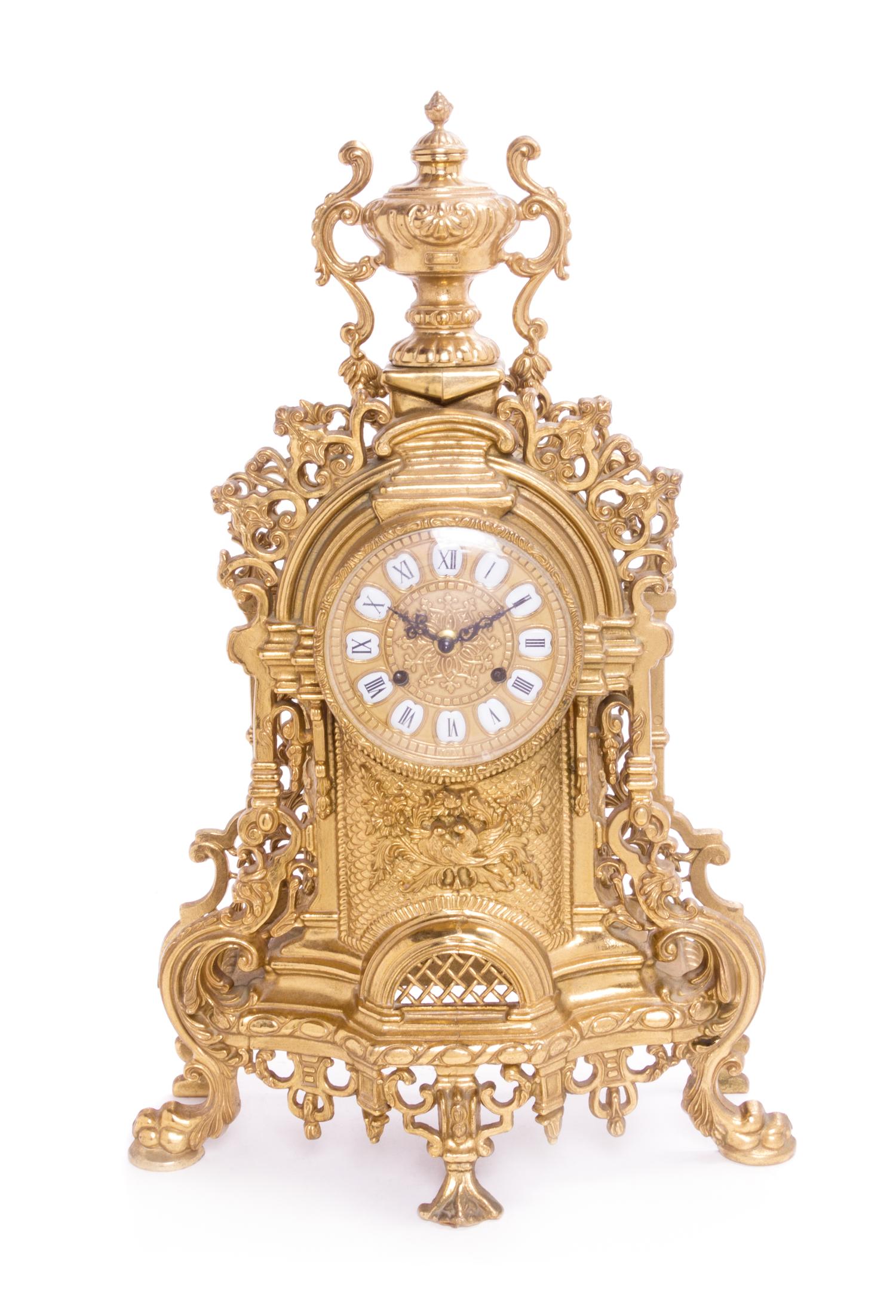 An Italian Gilt Brass Three-Piece Clock Garniture Height of clock 22 3/4 inches. — SECOND HALF 20TH CENTURY