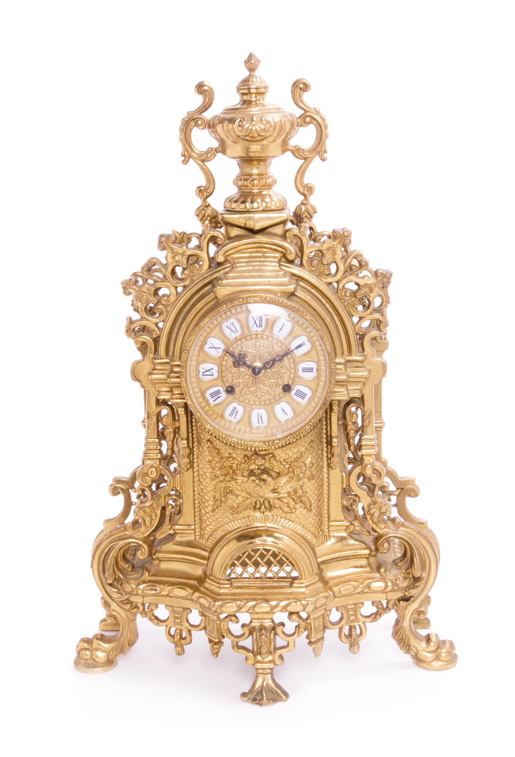 An Italian Gilt Brass Three-Piece Clock Garniture Height of clock 22 3/4 inches. — SECOND HALF 20TH CENTURY